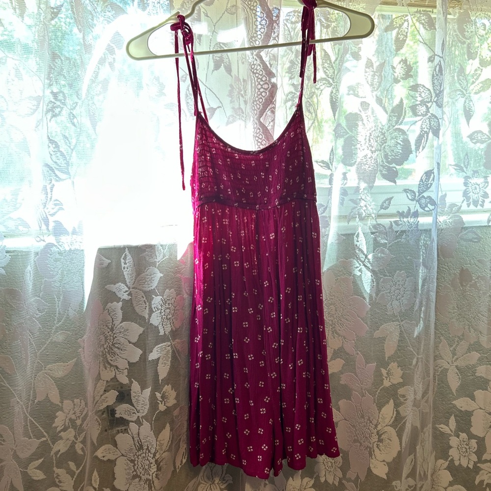 Size small urban outfitters romper with spaghetti straps and pockets.